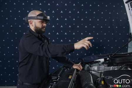 Technician Joey Lagrasta wearing the Hololens 2 device